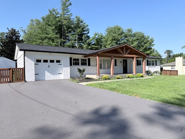 Photo - Updated 3BR Home in Beaver Lake | Fenced Yard, Garage, Covered Porch & Outdoor Fireplace | Pet Fr...
