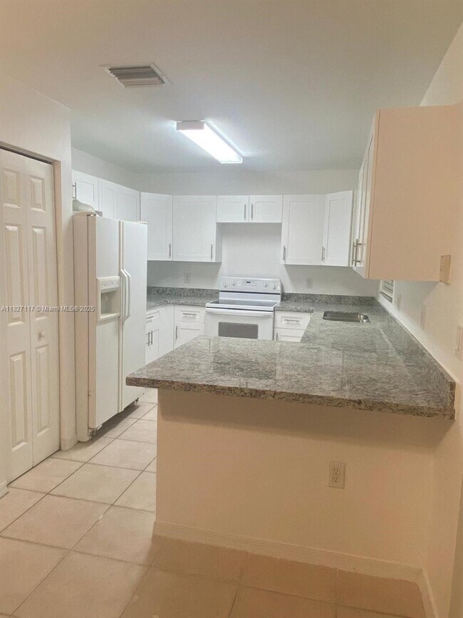 Photo - 17109 NW 23rd St Townhome