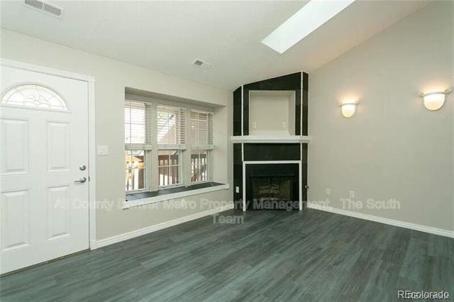 Building Photo - 9617 W Chatfield Ave Unit E