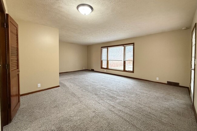 Photo - Spacious 4 Bedroom Home + Garage, Fenced Backyard & Bonus Lower Level