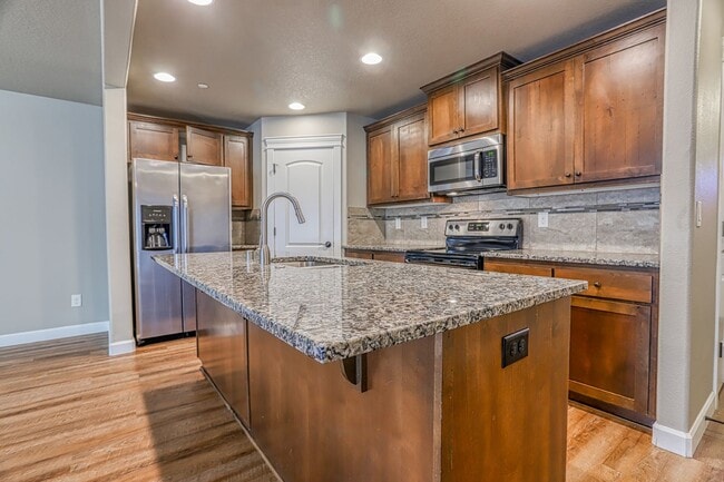 Photo - Centrally Located 4 Bedroom Townhome with Attached Garage & AC