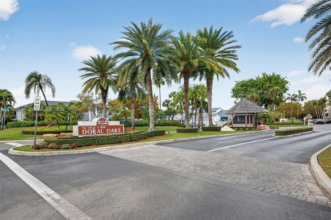 Building Photo - 9725 NW 52nd St Unit 103