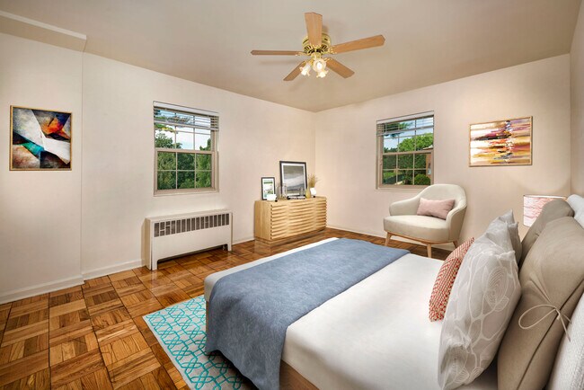 Cozy bedroom at Goodacre & Pine Ridge Apartments in Silver Spring, MD