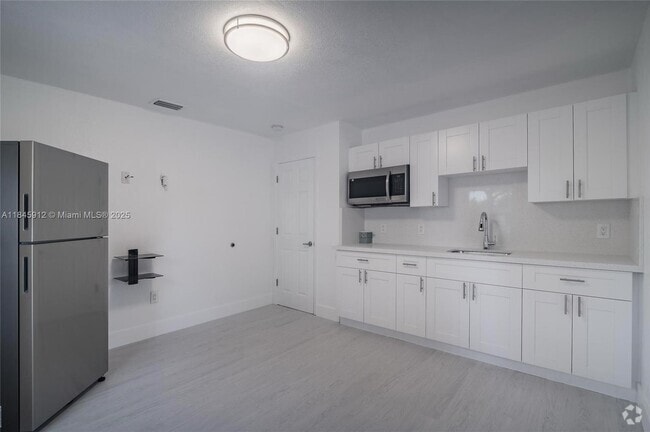 Building Photo - 595 NW 139th Terrace Unit 1 Rental