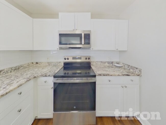 Photo - 1002 E 108th Ave