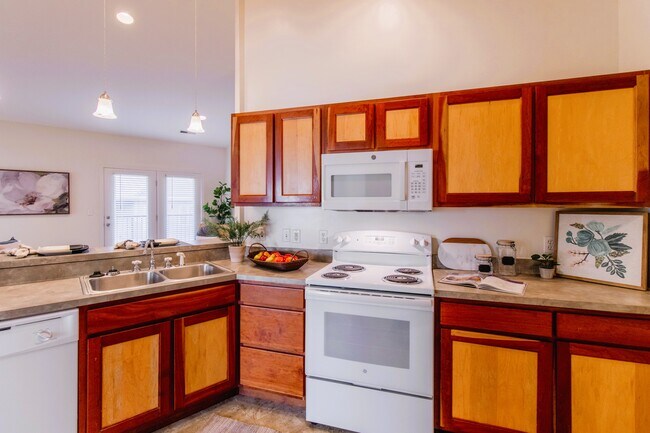 Spacious, open Kitchen, solid maple & cherry cabinets are locally crafted
