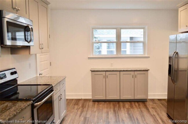 Kitchen View 3 w/ Storage/Bar space - 910 Knowles St