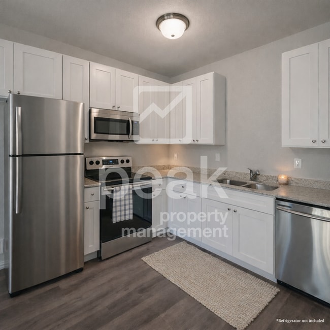 Photo - $1425! Stylish 2BR Townhome. Apply by 1/21 for 1425 free!