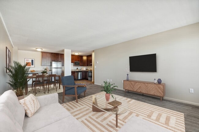 Step into the inviting living space at Central Lakes of Uptown, where modern design meets comfort. Enjoy an open layout and stylish finishes perfect for relaxation and entertainment. Don't miss your chance-schedule a tour today! - The Shores