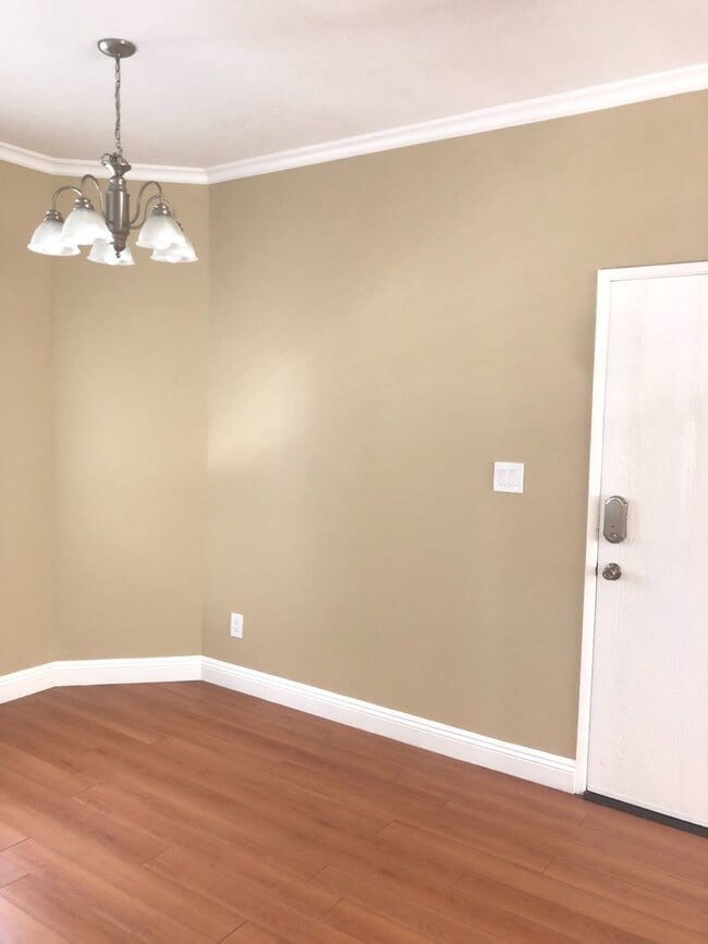 Photo - Beautiful 1 Bed/1 Bath Condo Apartment with Patio, Hardwood Flooring, Central AC, Washer and Drye...