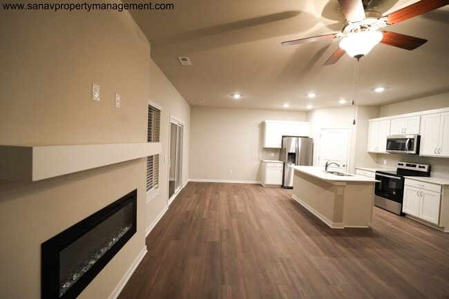 Photo - "Ranch Retreat: Seamless Serenity in Single-Level Splendor with Trailside Tranquility"