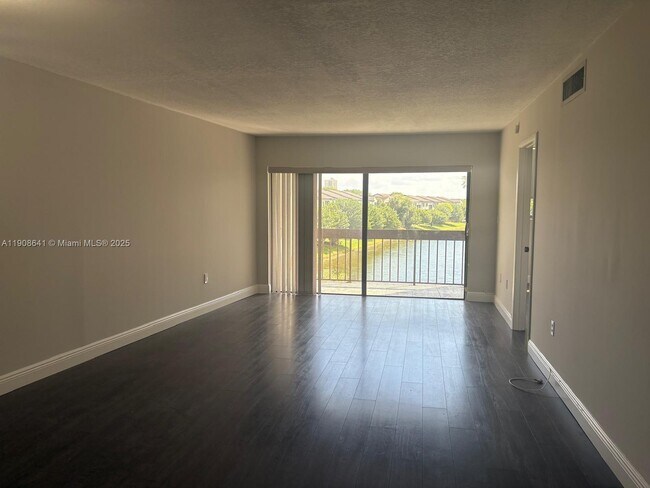 Building Photo - 10288 NW 9th St Cir Unit 307