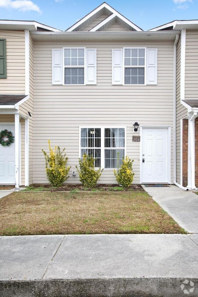 Building Photo - An adorable home! Pets Welcome!