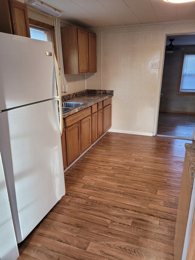 Kitchen leading into the Sunroom - 1132 N Trimble Rd