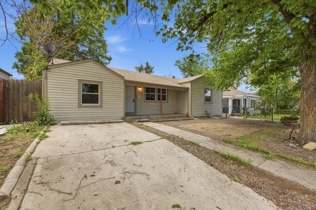 Photo - Four Bedroom Home In Aurora - ready ASAP. Brand New Paint Top to Bottom, with updated flooring!