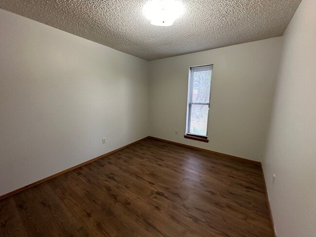 Photo - Introducing a charming 3-bedroom, 2-bathroom home located in Russellville, AR