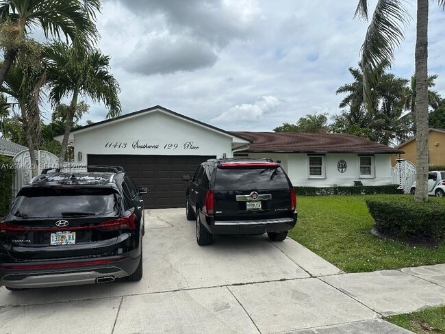 Building Photo - 11413 SW 129th Pl Unit Side