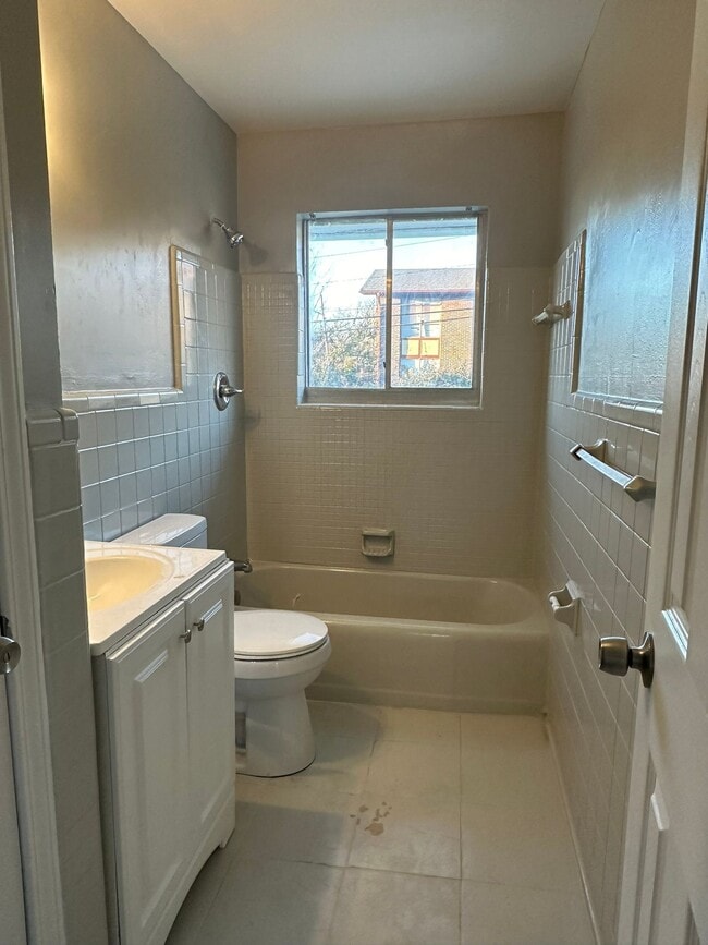 Photo - Brick Quadplex 2/1 in East Lake Unit 7728 Rugby Ave, B