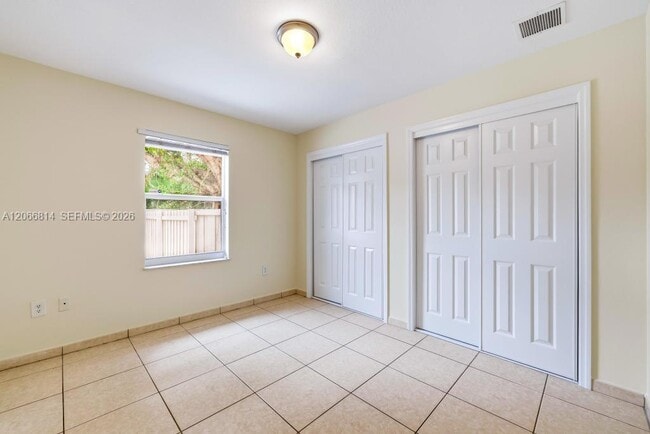 Building Photo - 3072 NW 14th St Unit REAR