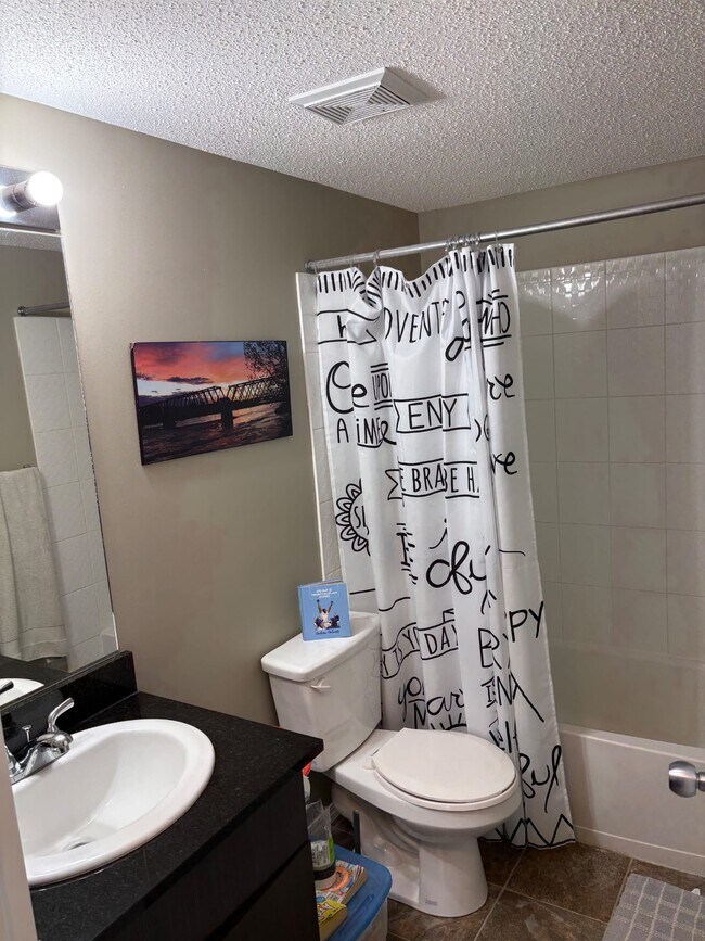 Photo - 403 Mackenzie Way SW Unit 205
