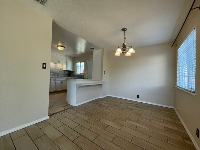 Photo - Charming 3-Bedroom Home with Fresh Interio...