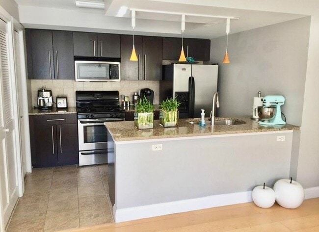 Building Photo - 125 70th St Unit 2D