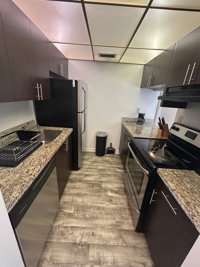 Building Photo - Now Leasing: 1-bedroom and 1.5 bath condo ...