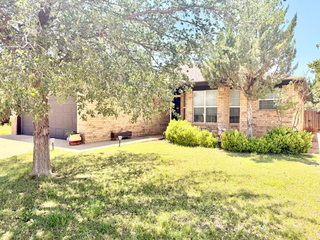Photo - Charming 3 Bed, 2 Bath Brick Home on Corner Lot – Fireplace, 2-Car Garage & Conveniently located!