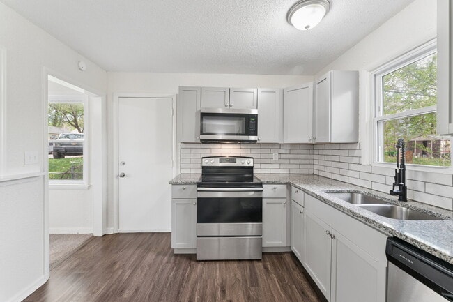 Photo - Fully Renovated 2BR/2BA + Bonus Room – Quiet Living with Spacious Backyard!  1st Month is FREE!