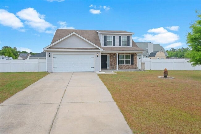 Building Photo - Spacious 5-Bedroom Home with Screened Patio & Private Fenced Yard in Guyton