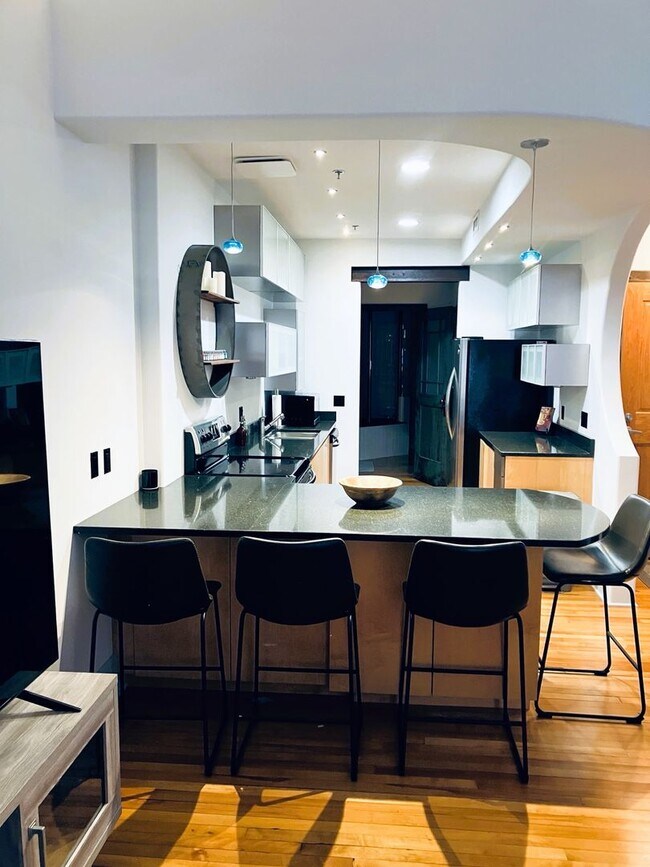 Photo - Turn-Key Downtown Asheville Condo | Historic Old Penney’s Building | Rooftop Views