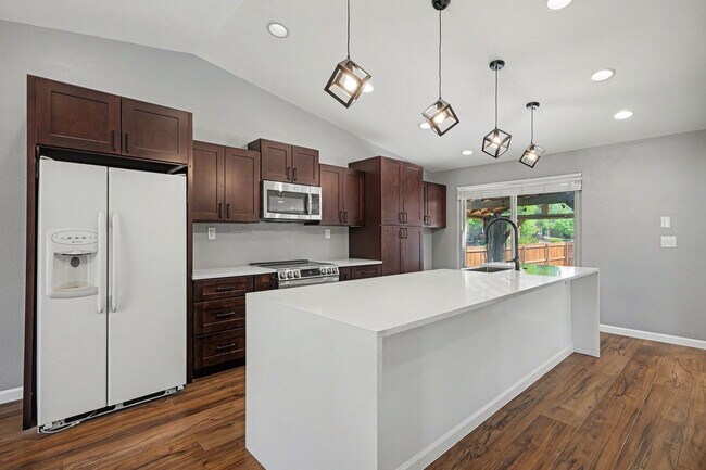 Photo - Updated 4BR Corner Lot Home with Finished Basement & 2-Car Garage