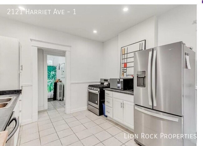 Building Photo - 2121 Harriet Ave Unit 1 Rental