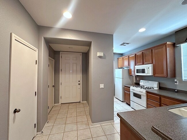 Photo - Spacious 3-Bedroom Home in Gated Community with Pool & Private Backyard
