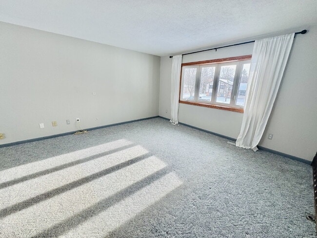 Photo - Nice Single family home 4-Bedroom Retreat with 2 Baths in Eagan – Your Perfect Home Awaits