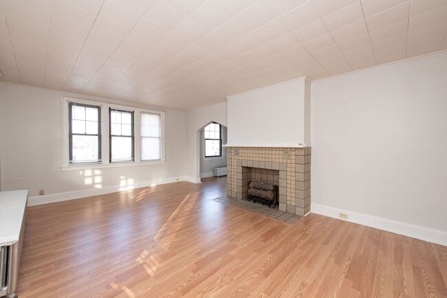 Photo - Beautifully updated Tudor style duplex. Upper unit. Large rooms. 2 balconies, private entry. Fenc... Unit #1 Ferguson Pl 4950