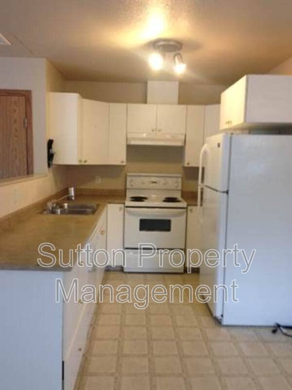 Photo - 10019-10108 108 Ave