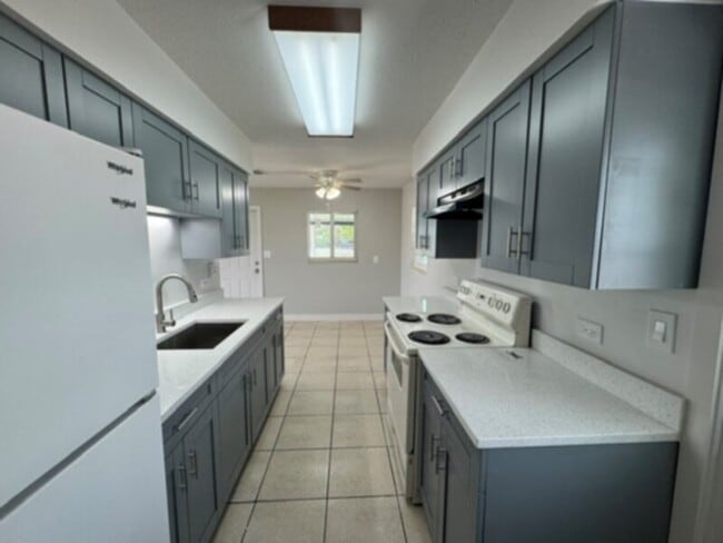 Photo - New Kitchen, Fresh Paint and a Large Screen in Lanai!