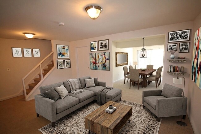 Elevate your lifestyle at Treetop Apartments with this inviting living space that blends comfort and style. Enjoy the spacious layout perfect for relaxation and entertaining. Don't miss out—schedule a tour today!