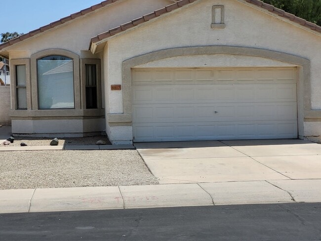 Building Photo - 8817 N 65th Dr