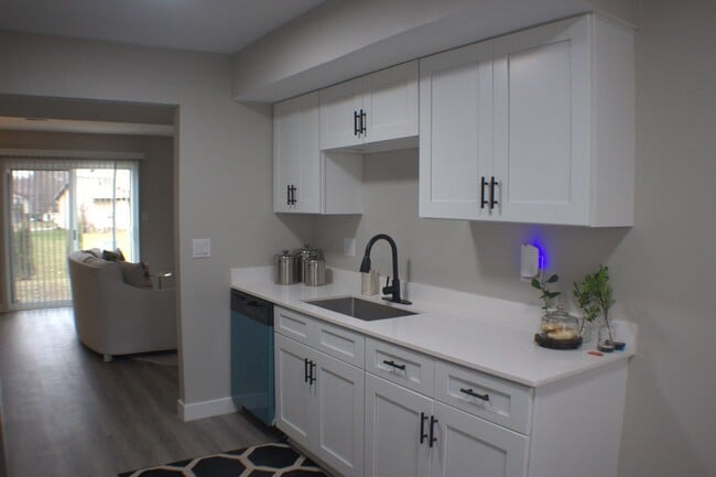 Photo - Renovated 2-Bedroom, 1.5-Bathroom Condo in South Bend – $1,435/Month – Accepting Section 8 (Lawn ...
