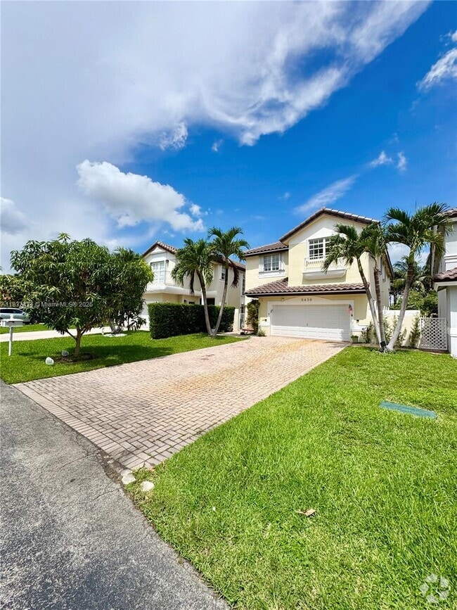 Building Photo - 5630 NW 104th Ct Rental