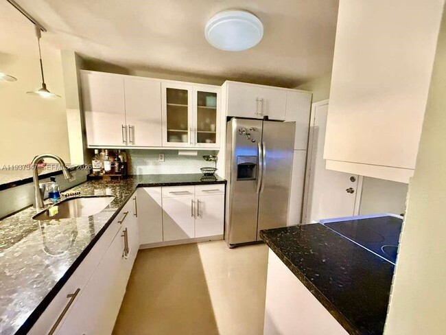 Building Photo - 1400 NE 191st St Unit 106