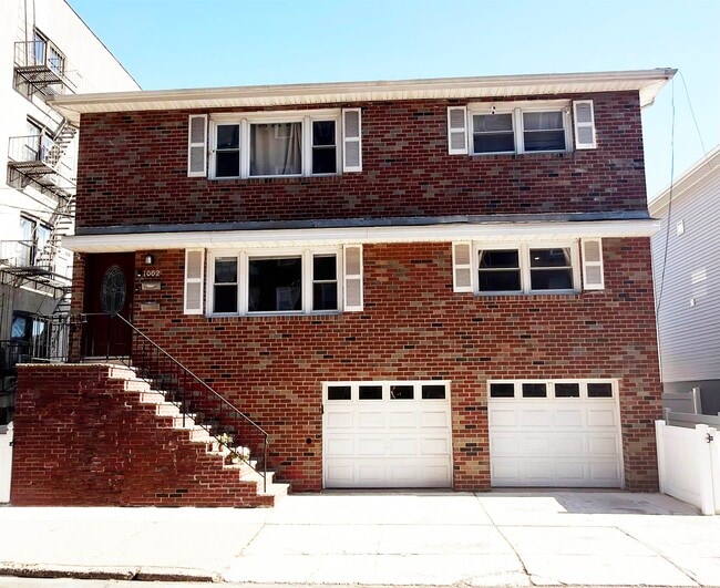 Building Photo - 1002 87th St Unit 1