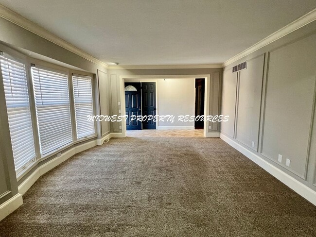 Photo - Spacious 4-Bedroom, 3-Bathroom Home with Fenced Yard and Bonus Spaces!