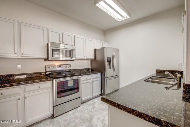 Building Photo - 11260 N 92nd St Unit 1115