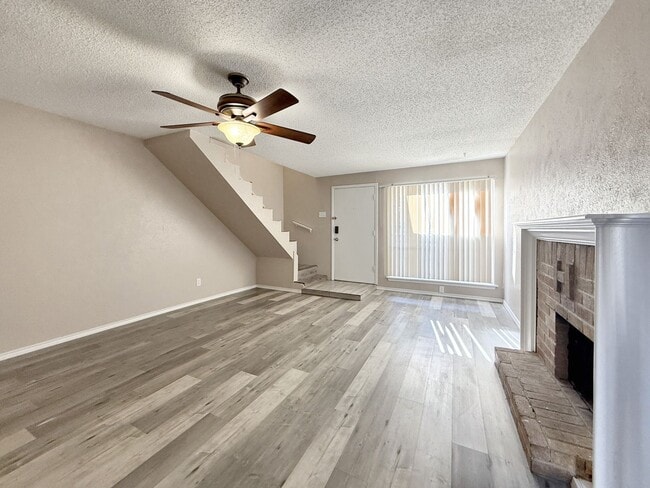 Photo - 3-Bedroom Duplex with Modern Flooring, Fireplace & Spacious Layout in Grand Prairie