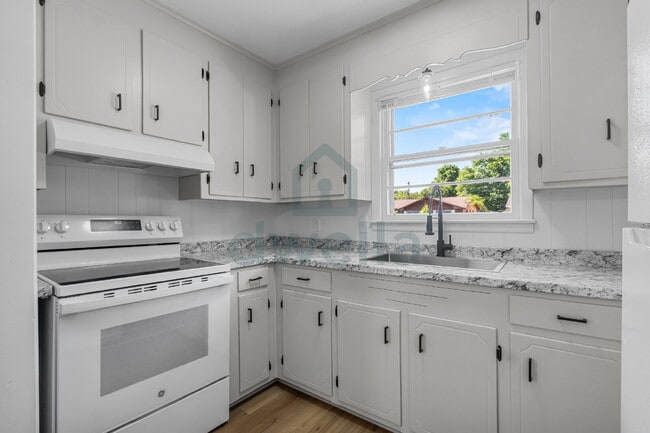 Photo - 3-Bedroom (1.5 Baths) Fully Renovated Rental Home in a PRIME Location! Only 6 minutes to Downtown...