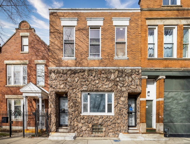 Building Photo - 2702 S Spaulding Ave Unit 2