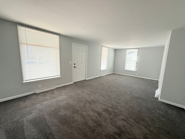 Photo - Spacious 4-Bedroom Home with Fenced Backyard